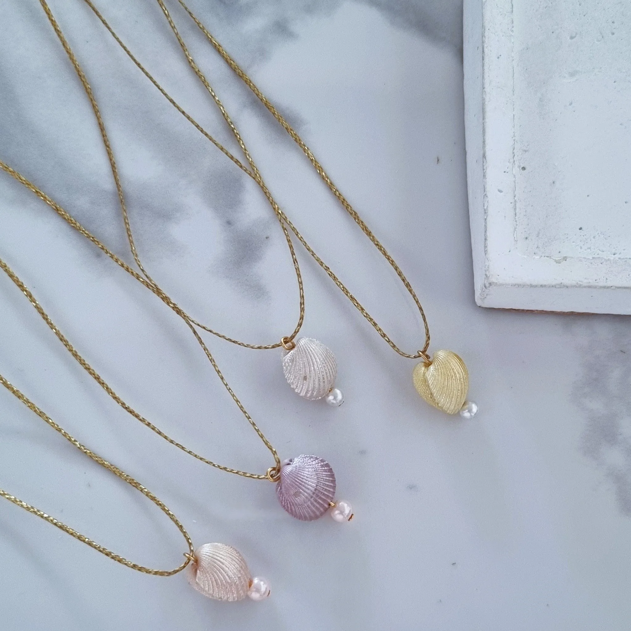 Tiny seashells charms